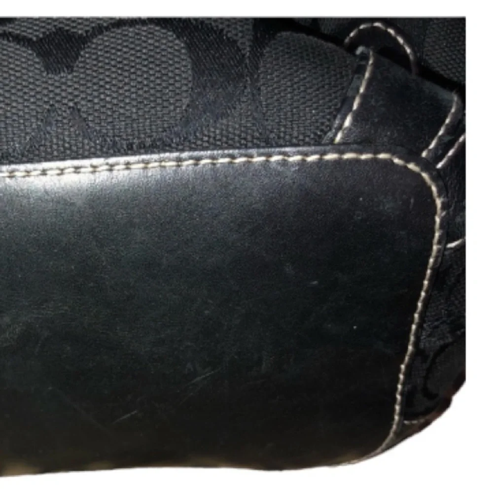 Coach black canvas monogram shoulder bag , leather trim see matching pieces